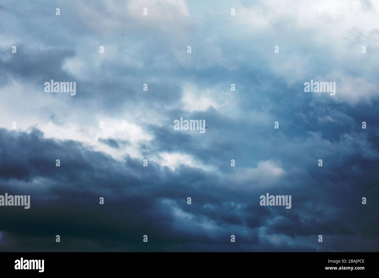 Blue cloudy sky. Before the rain Stock Photo - Alamy