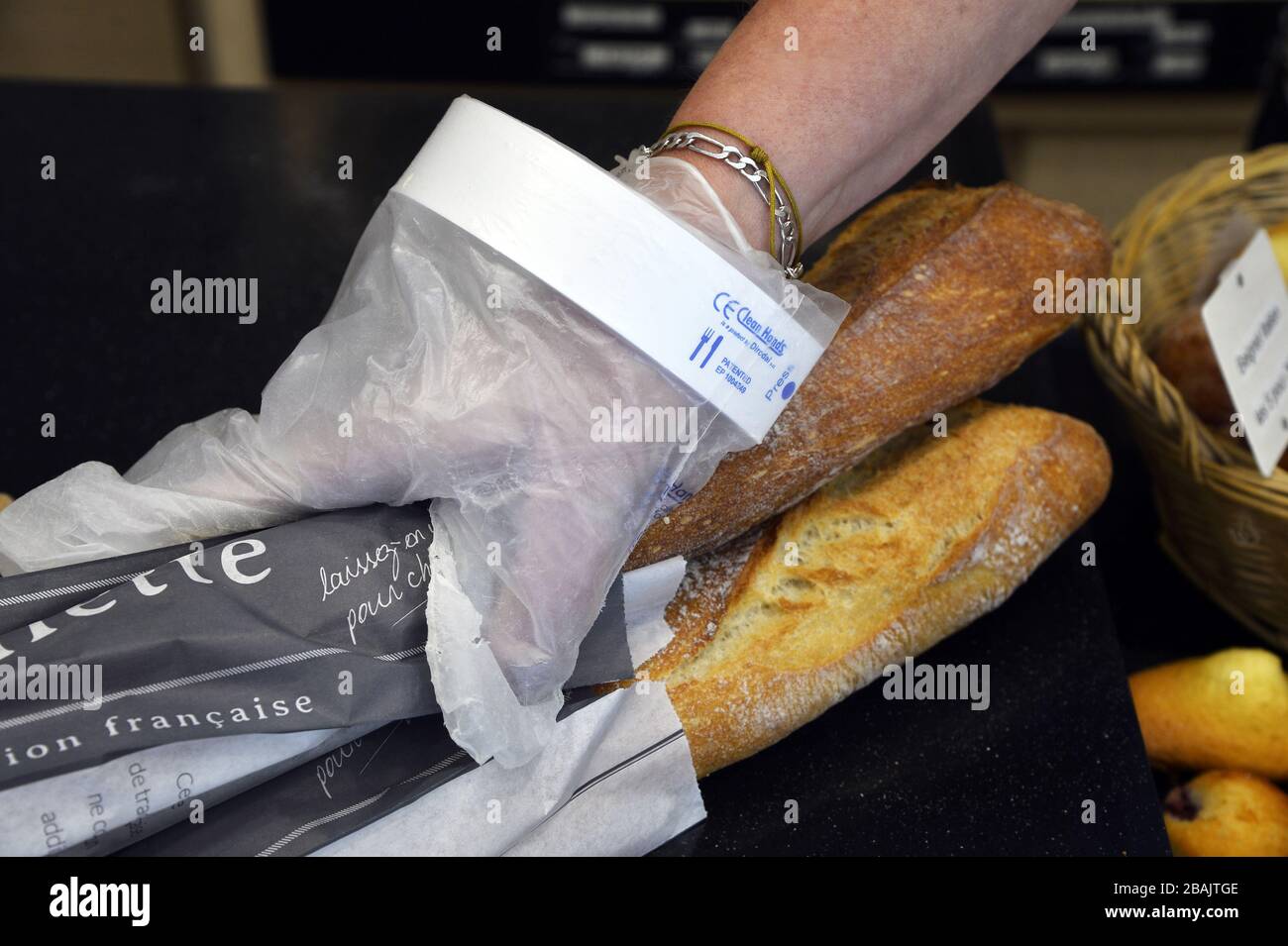 Implementing more drastic hygiene measures against coronavirus in french Bakery - Paris - France Stock Photo