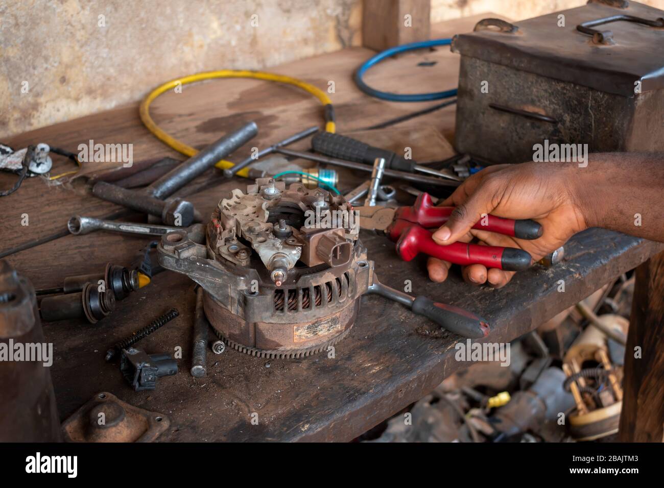 hand screwdriver spanner and tools on a mechanical table Stock Photo