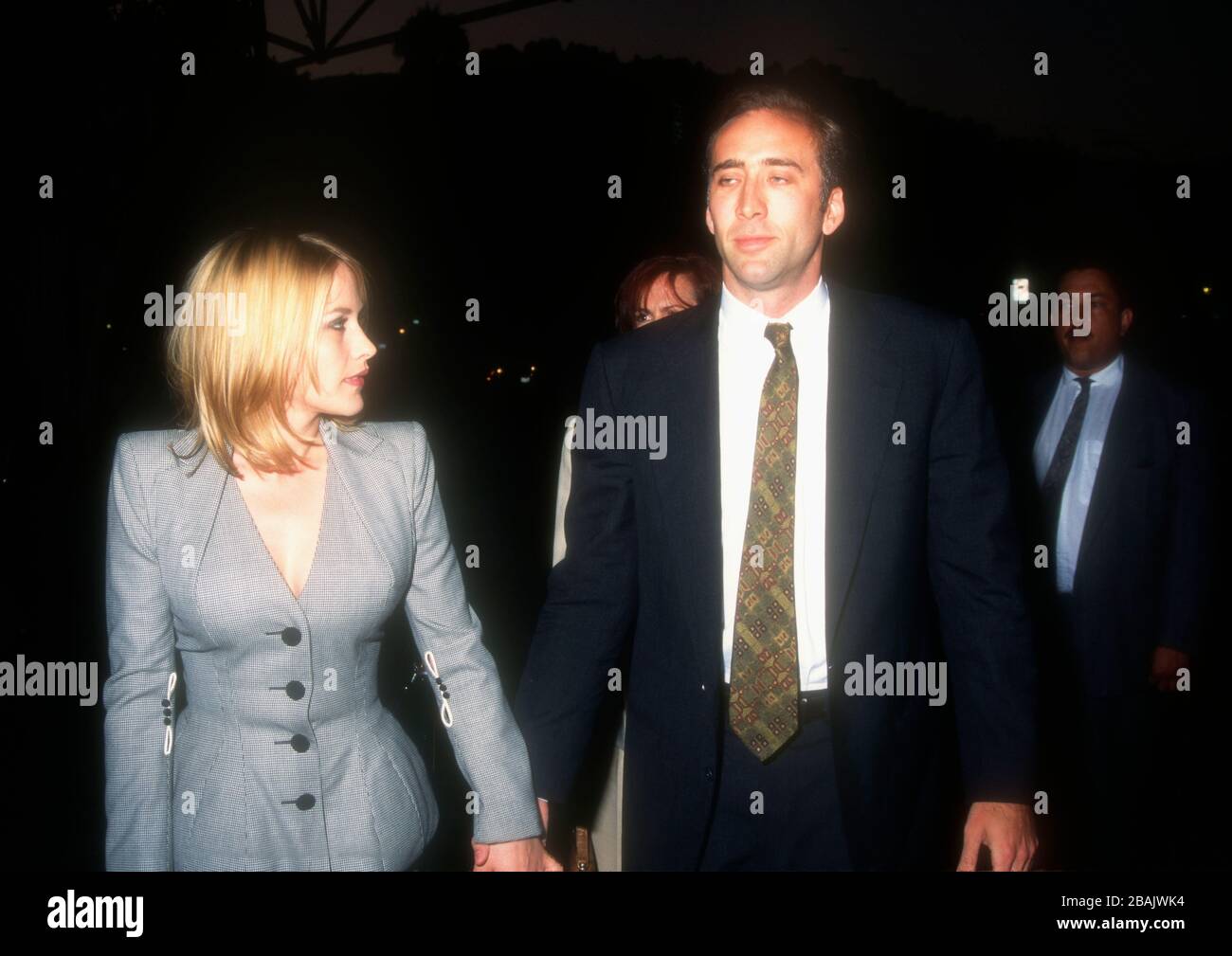 Los Angeles, California, USA 22nd August 1995 Actress Patricia Arquette and husband actor Nicolas Cage attend Columbia Pictures 'Beyond Rangoon' Premiere on August 22, 1995 at DGA Theater in Los Angeles, California, USA. Photo by Barry King/Alamy Stock Photo Stock Photo