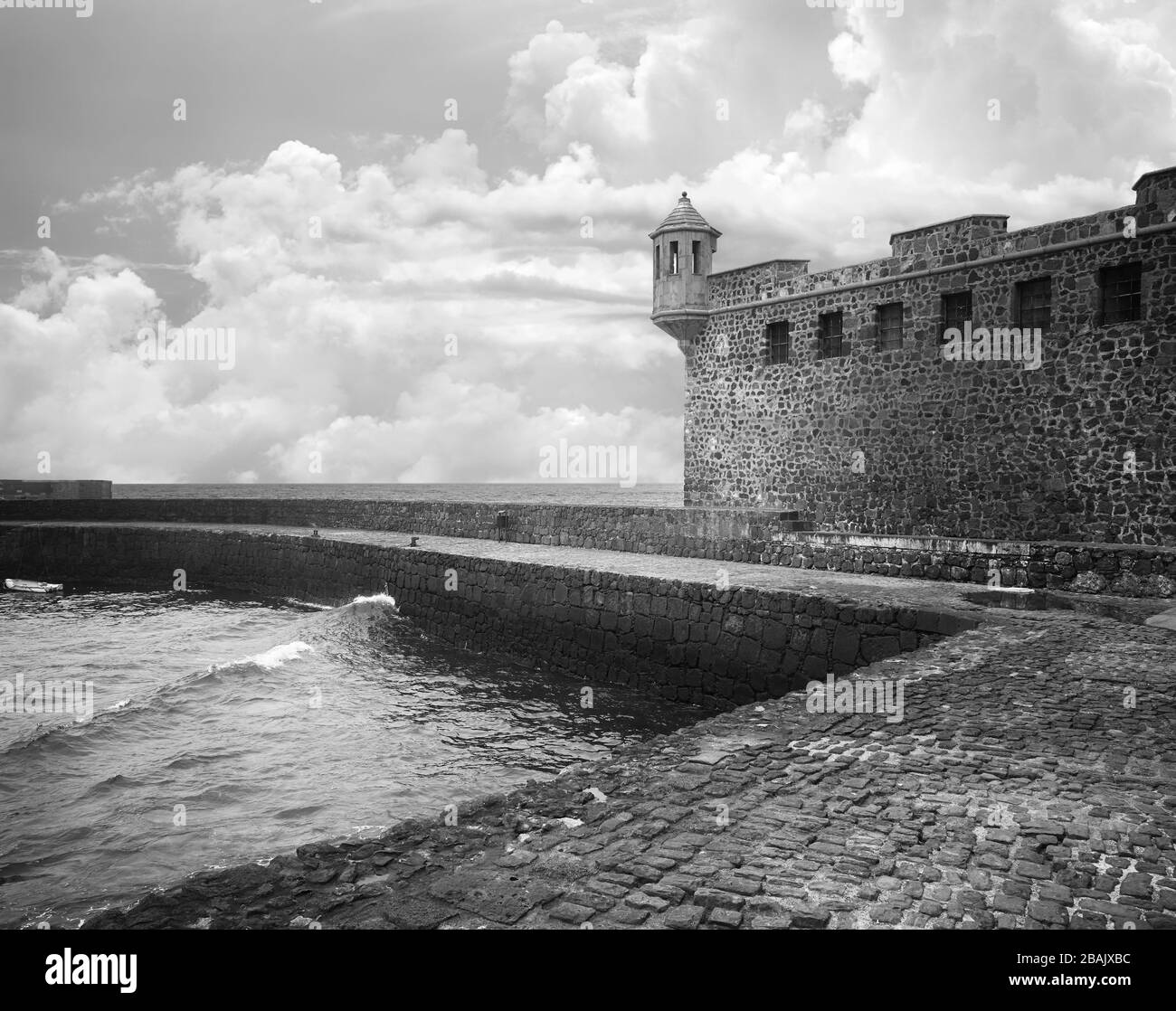 Black and white picture of Bateria de Santa Barbara fortress in Puerto de la Cruz, Tenerife, Spain. Stock Photo