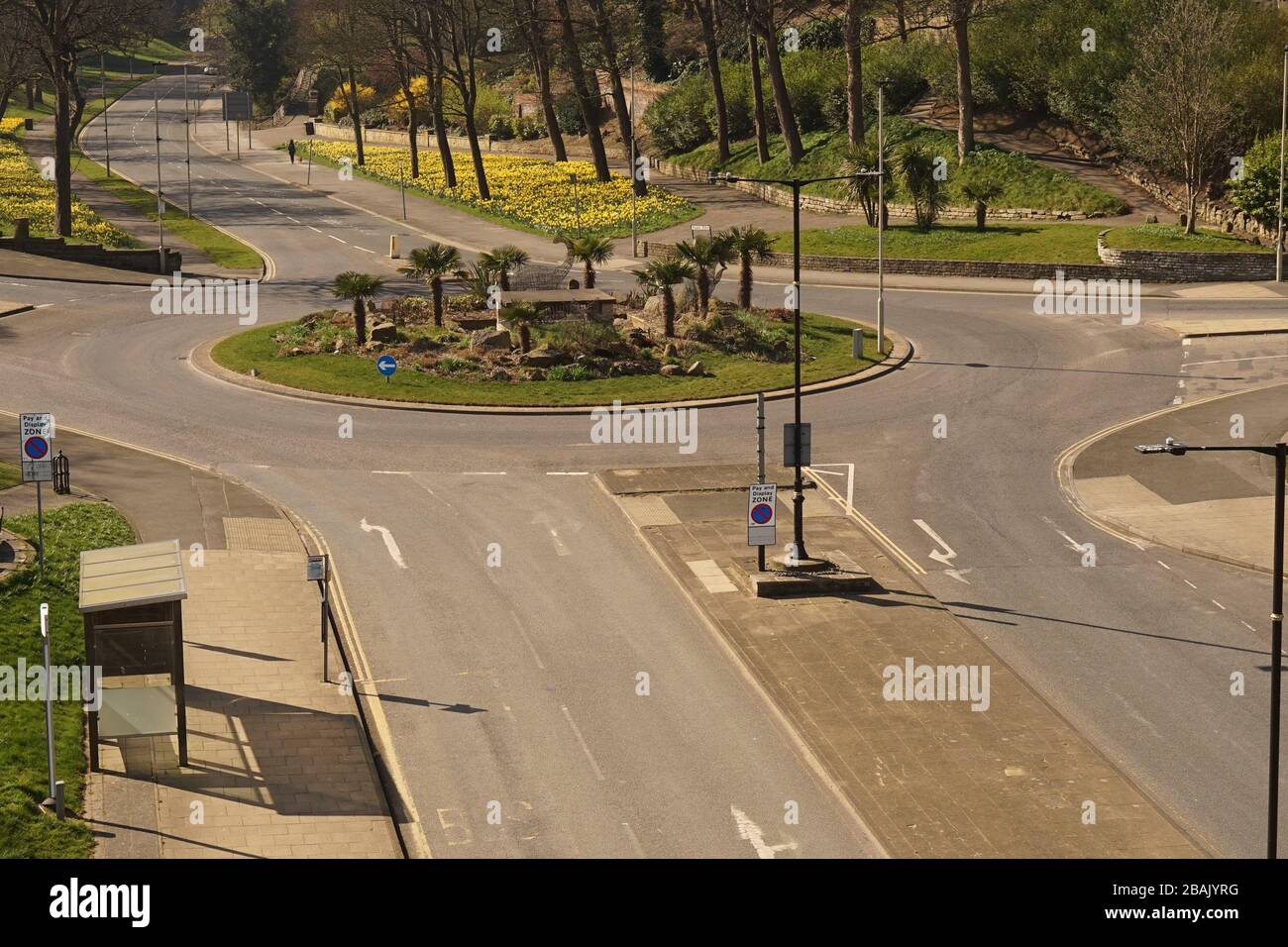 An empty roundabout in Scarborough, North Yorkshire due to Coronavirus government lock down advice Stock Photo