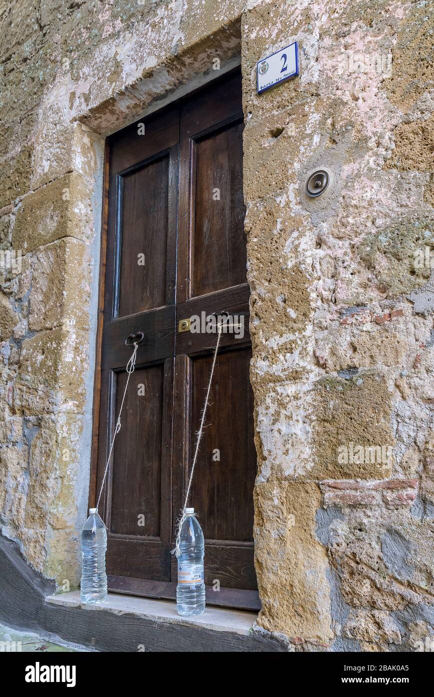 The ancient custom of putting plastic bottles full of water outside the