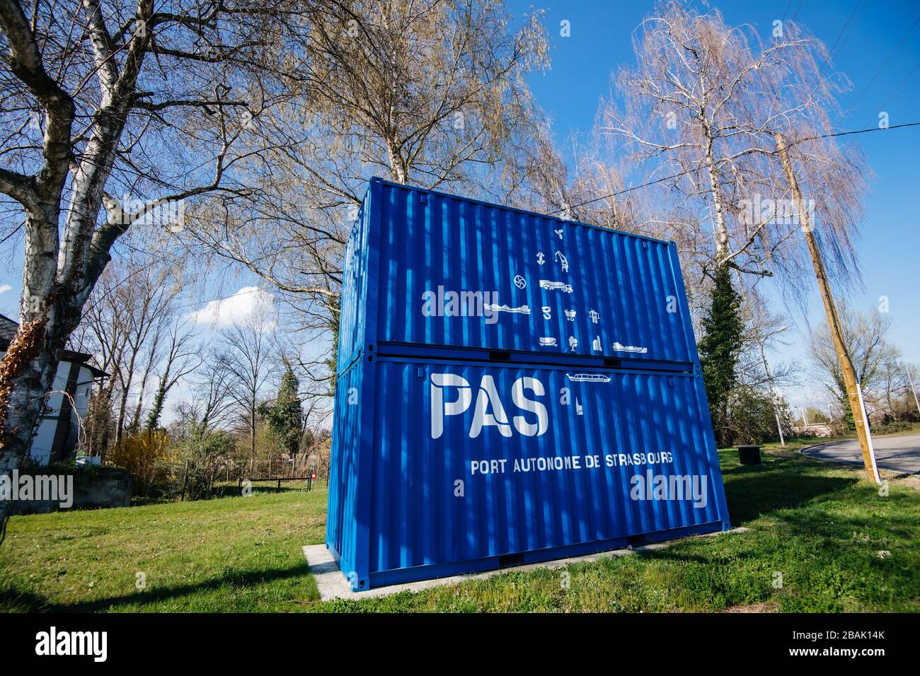 Strasbourg, France - Mar 18, 2020: Cargo containers painted in blue color and PAS signage from Port Autonome de Strasbourg Free Port near Robertsau neighborhood entrance Stock Photo