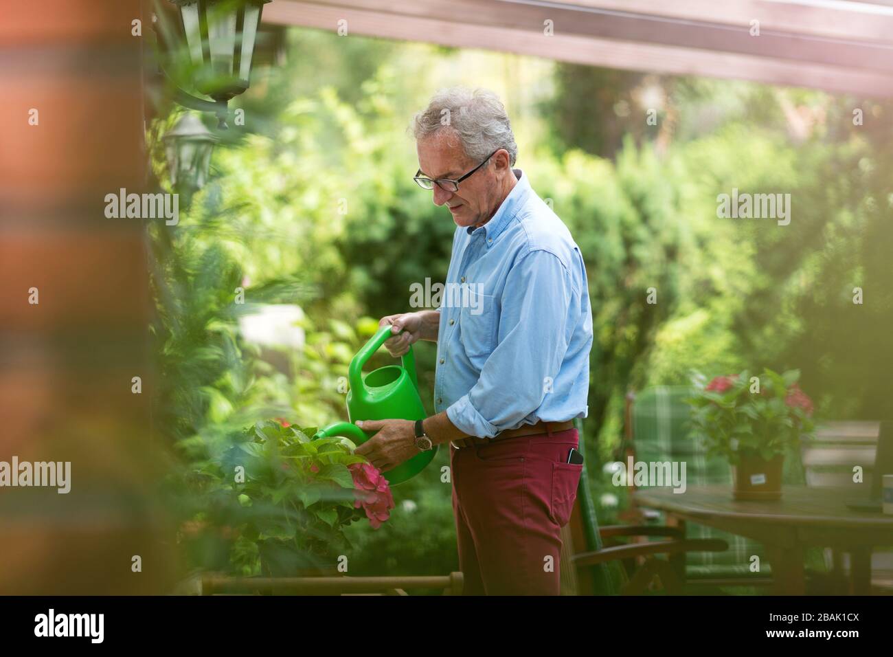 Man working on garden hi-res stock photography and images - Alamy
