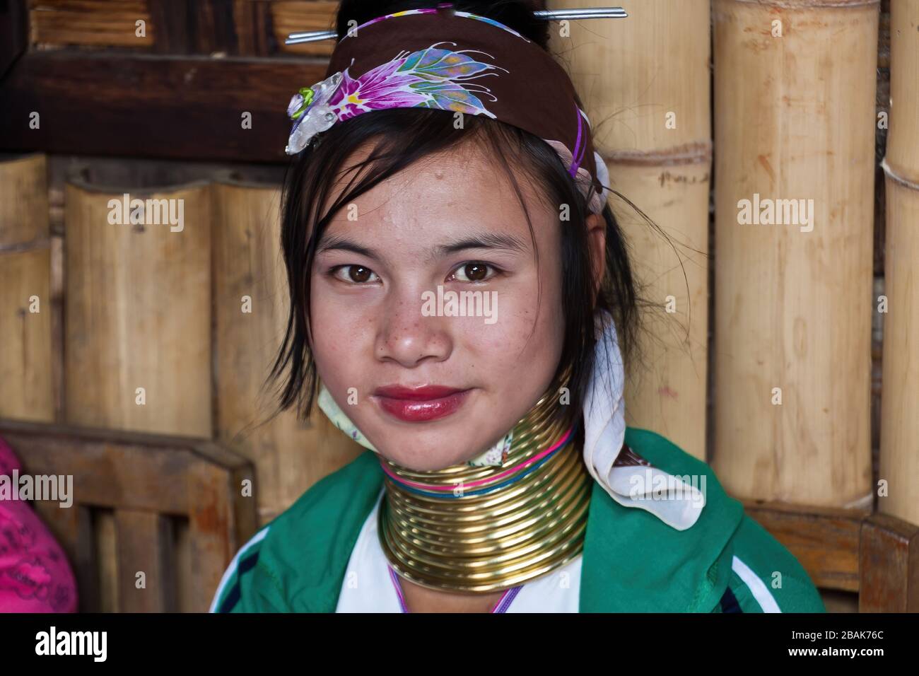 A Kayan Lahwi girl wearing neck coils, Inle Lake, Myanmar Stock Photo