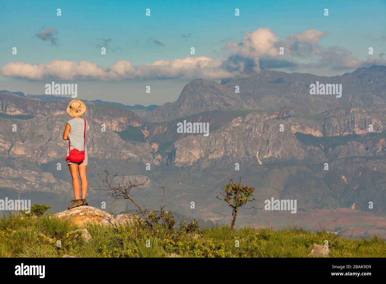 A tourist enjoys the view of the Chimanimani mountains in Zimbabwe. Stock Photo