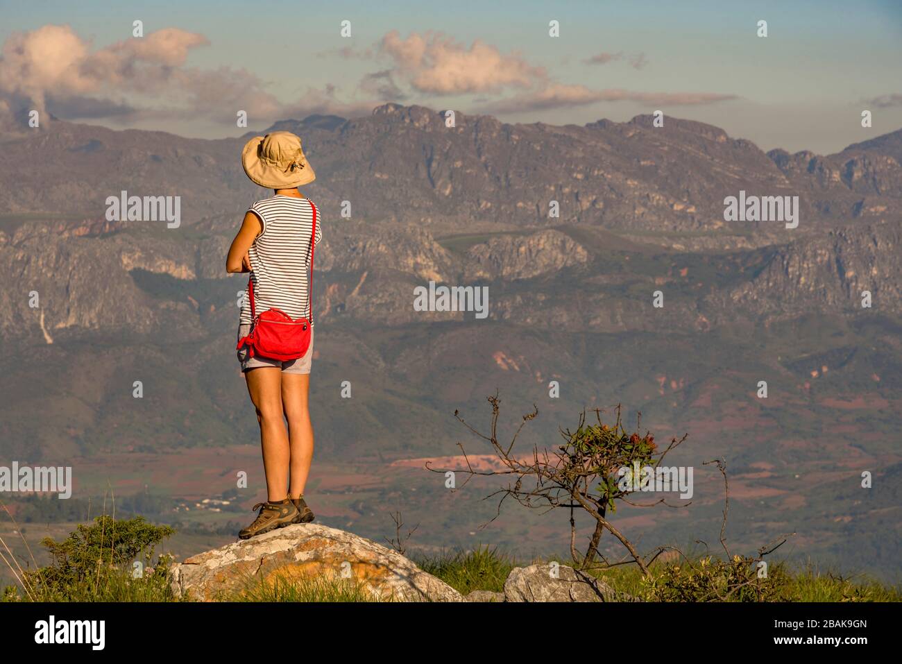 A tourist enjoys the view of the Chimanimani mountains in Zimbabwe. Stock Photo