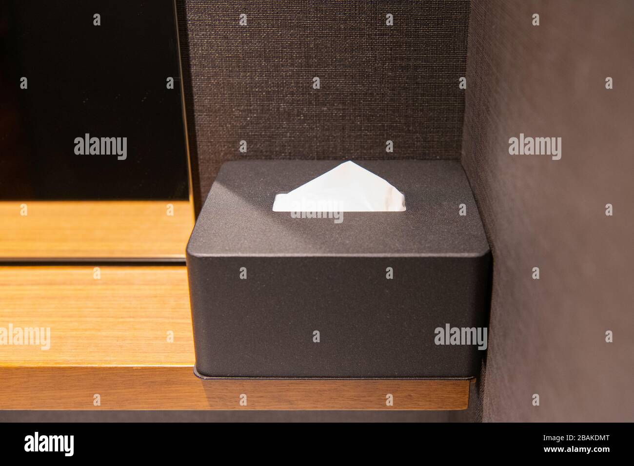 Tissue paper on the table in the room. ( Hotel Guest Room Supplies