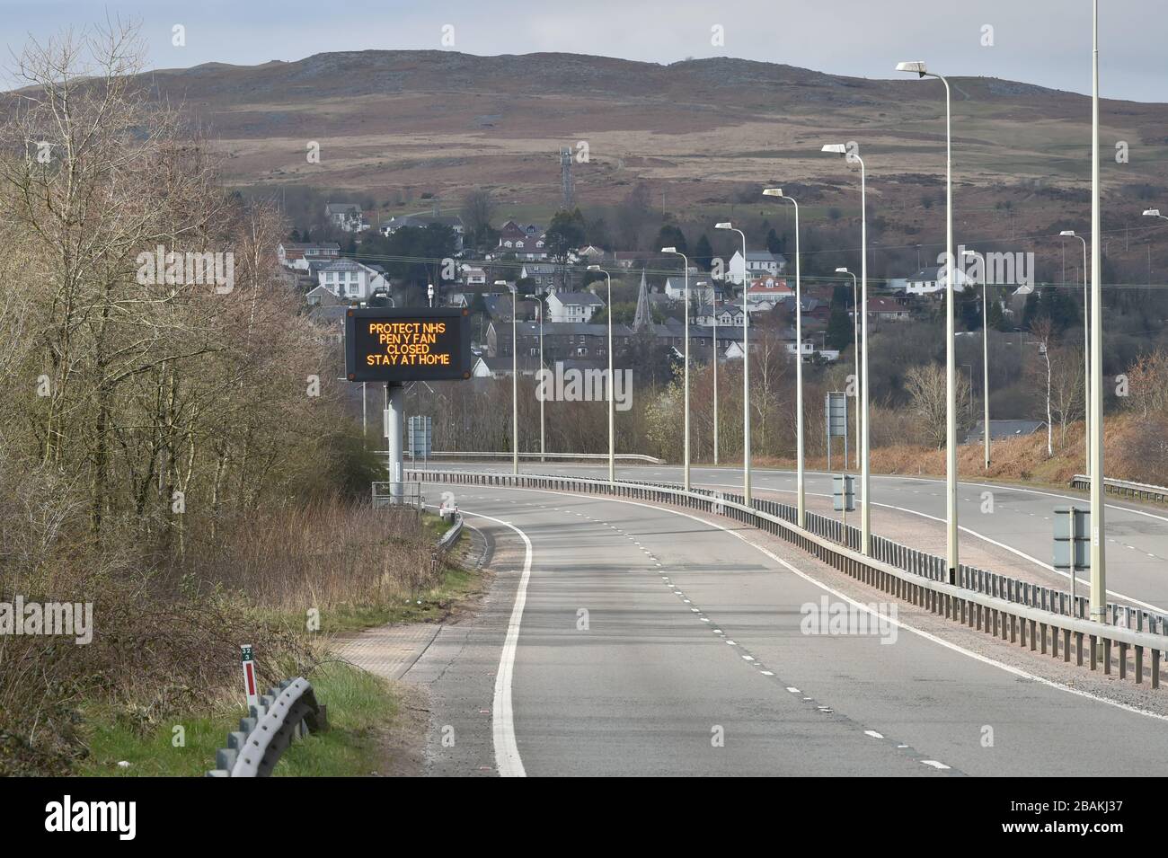 A sign on the empty A470 in Merthyr Tydfil, heading towards Brecon, informing drivers that Pen Y Fan is closed to visitors, as the UK continues in lockdown to help curb the spread of the coronavirus. Stock Photo