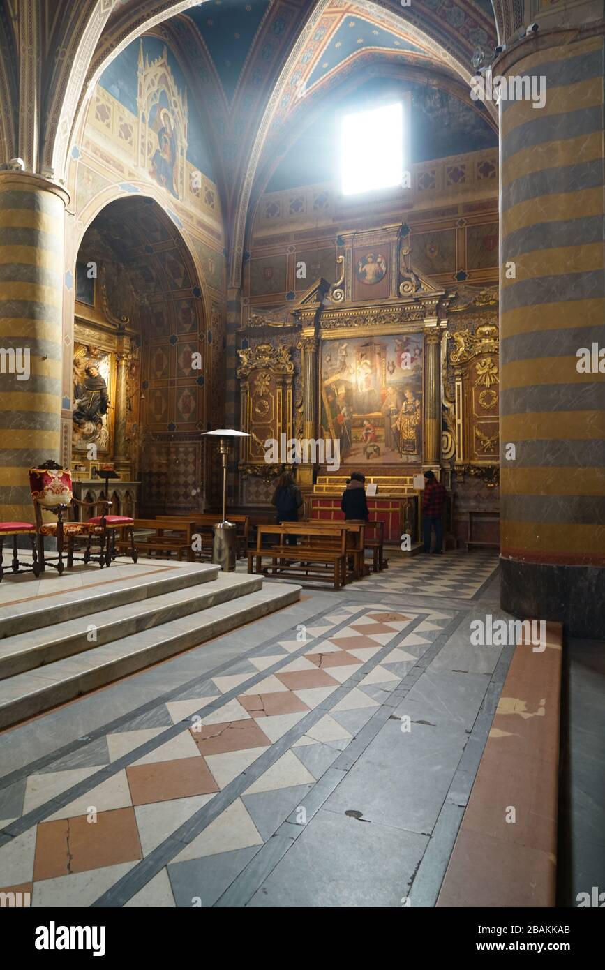 Interior of Chiesa di Sant' Andrea church, Madonna in trono e santi, Madonna enthroned and saints, Pinturicchio painter, oil painting on table, Spello Stock Photo