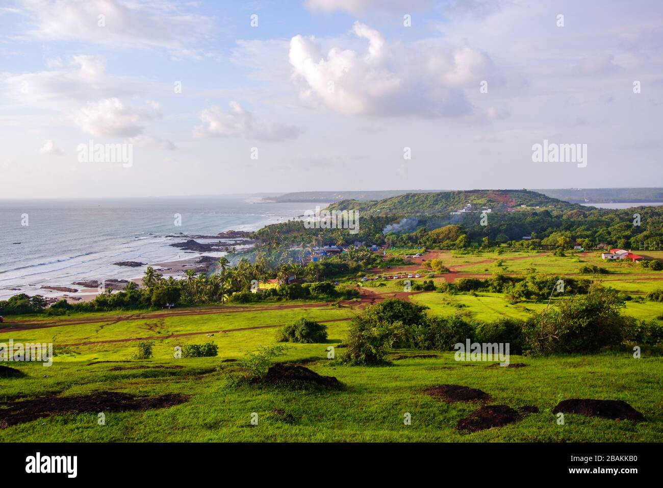 Beautiful secluded view of the coastline from Ozran Heights, Bardez, Goa, India. Chapora Fort can also be seen ahead. Stock Photo