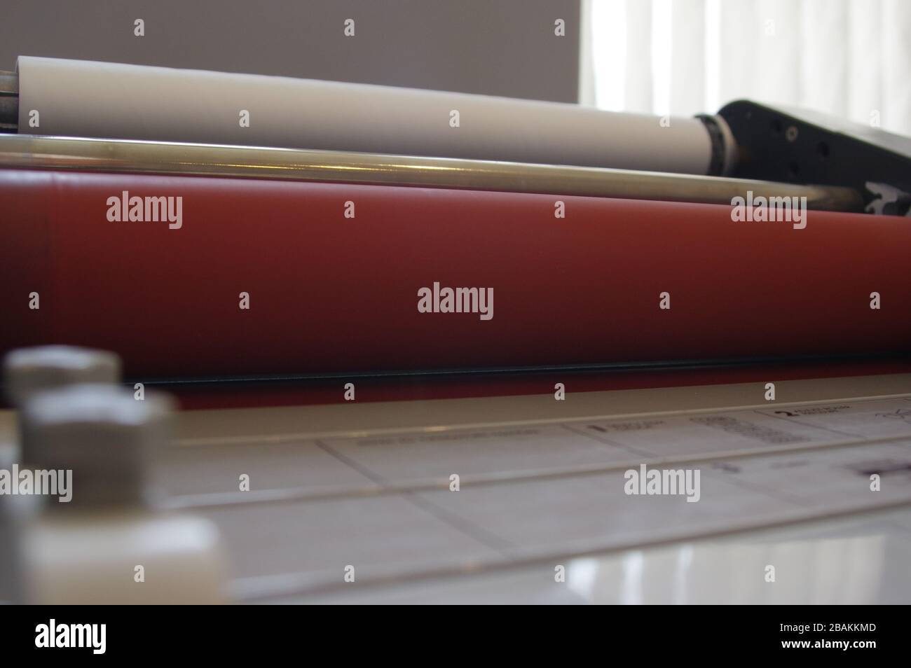 Plastic laminating machine Stock Photo Alamy