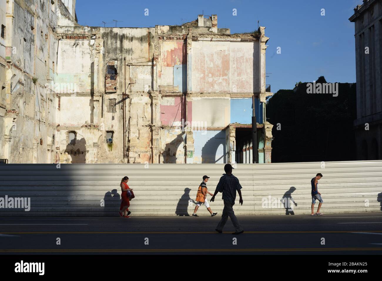 People, demolished building, street, 2014, Cuba Stock Photo