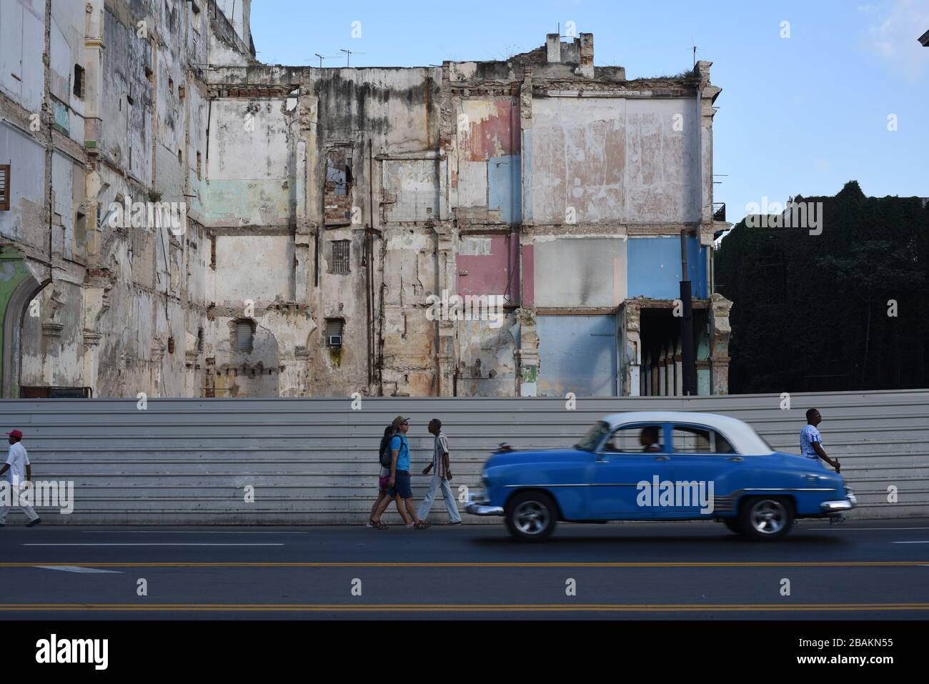 People, car, demolished building, street, 2014, Cuba Stock Photo