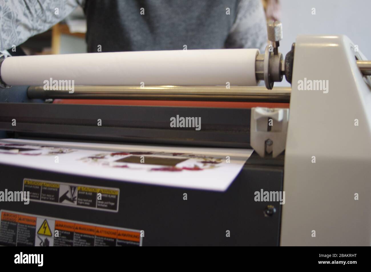 Plastic laminating machine Stock Photo Alamy