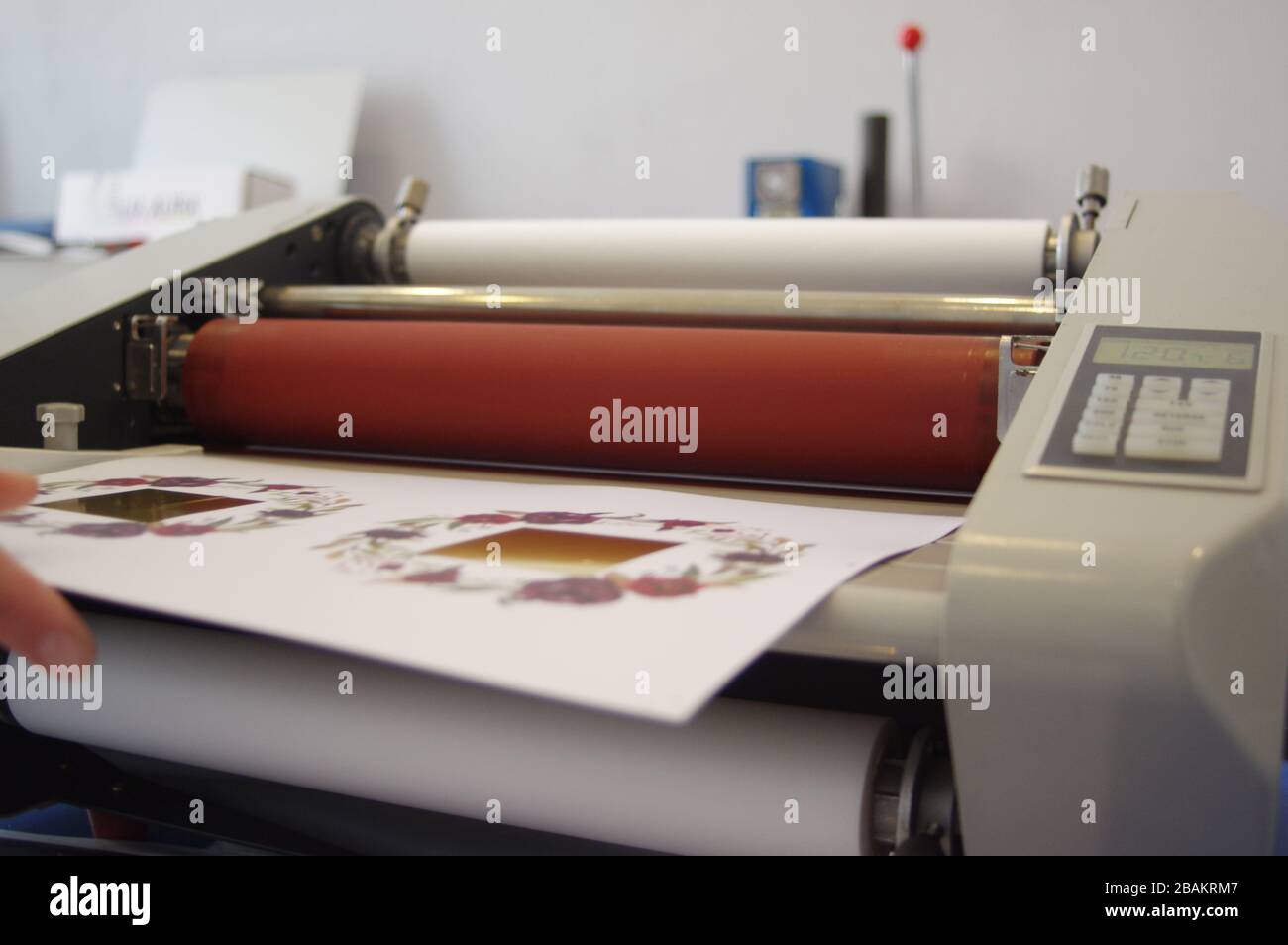 Plastic laminating machine Stock Photo Alamy