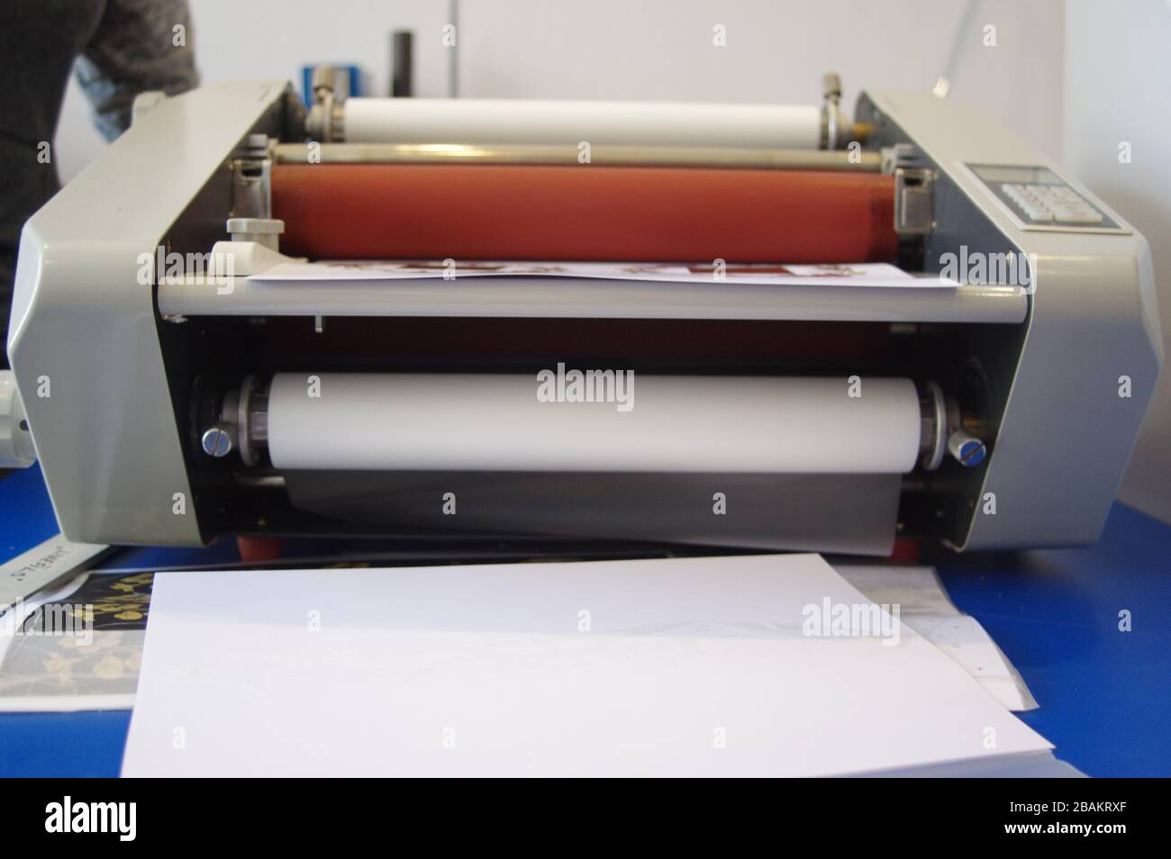 Plastic laminating machine Stock Photo Alamy