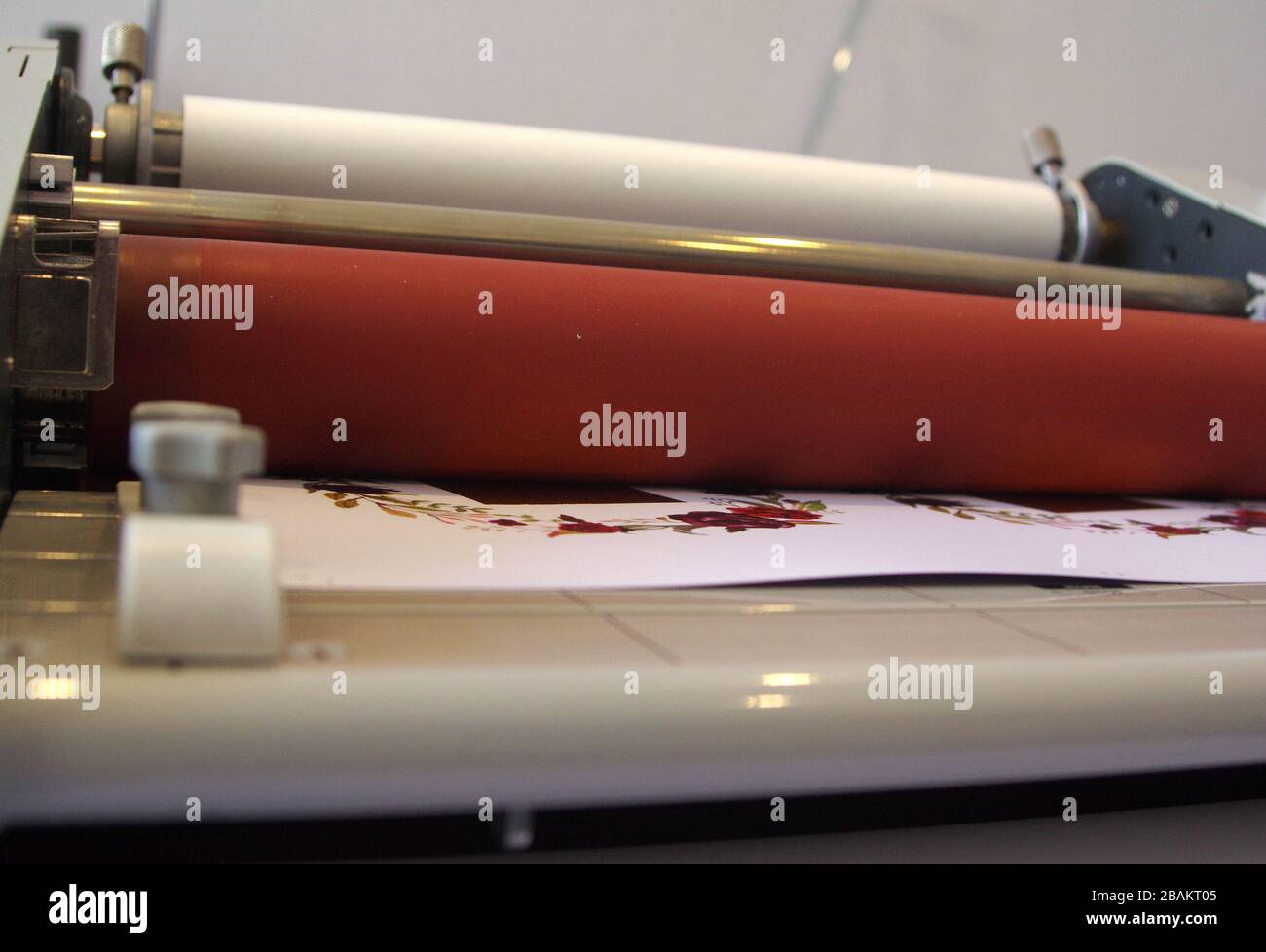 Plastic laminating machine Stock Photo Alamy