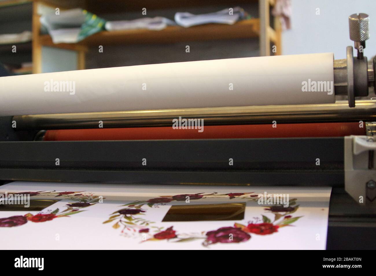 Plastic laminating machine Stock Photo Alamy