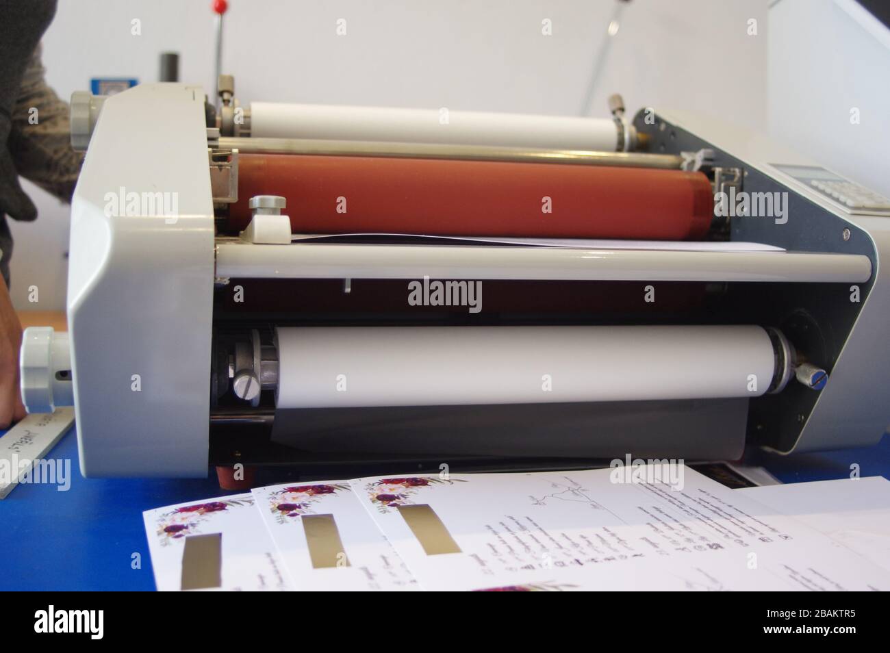 Plastic laminating machine Stock Photo Alamy