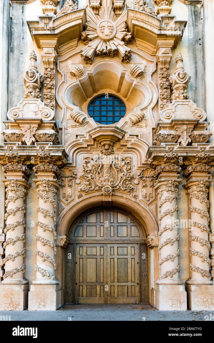 Vertical view of an old building facade with fantastical rococo and