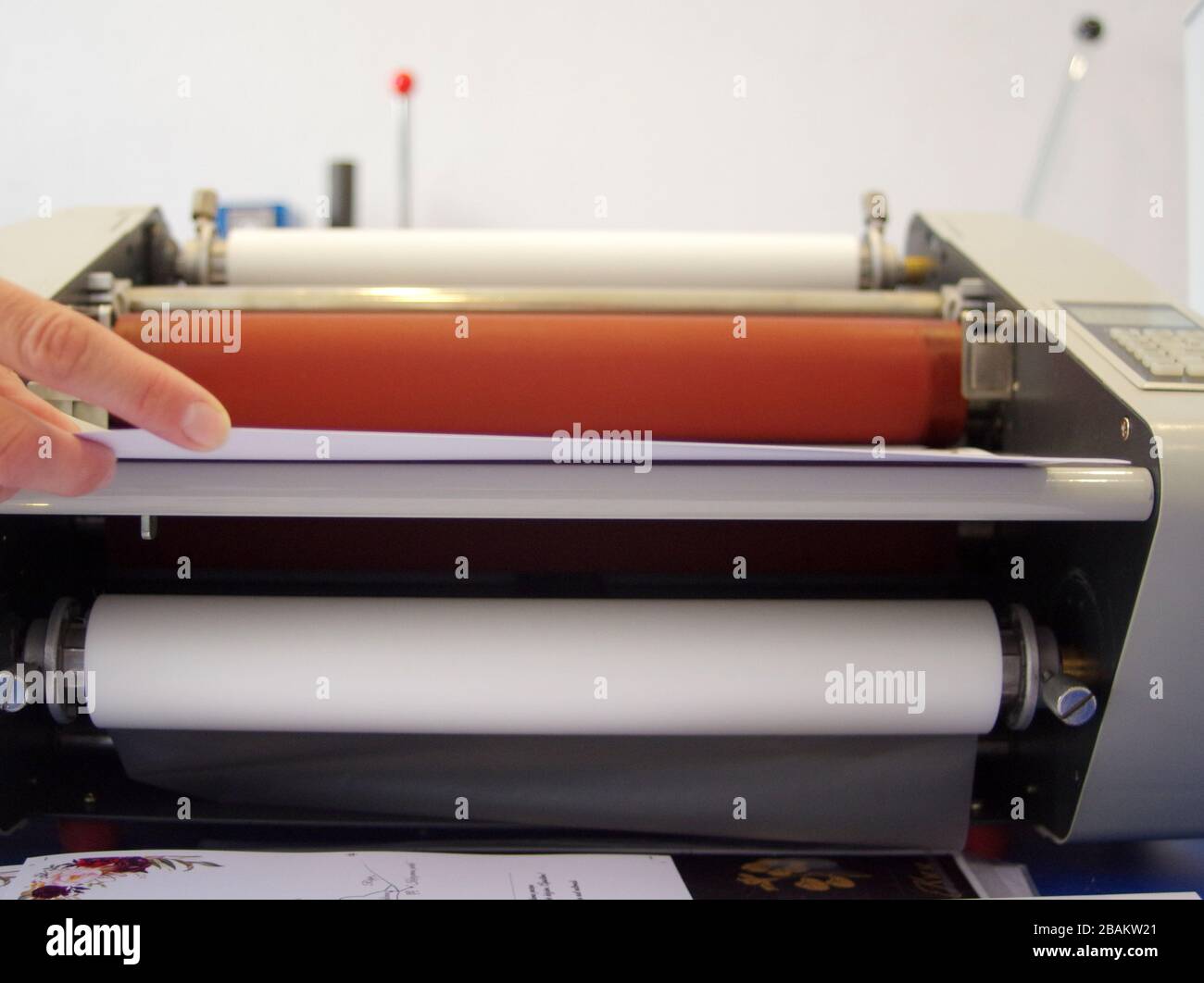 Plastic laminating machine Stock Photo Alamy