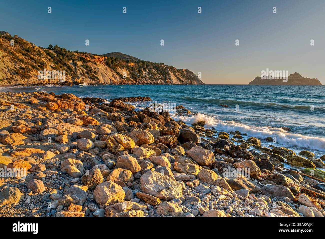 Sunset at Cala d'Hort beach, Ibiza, Balearic Islands, Spain Stock Photo