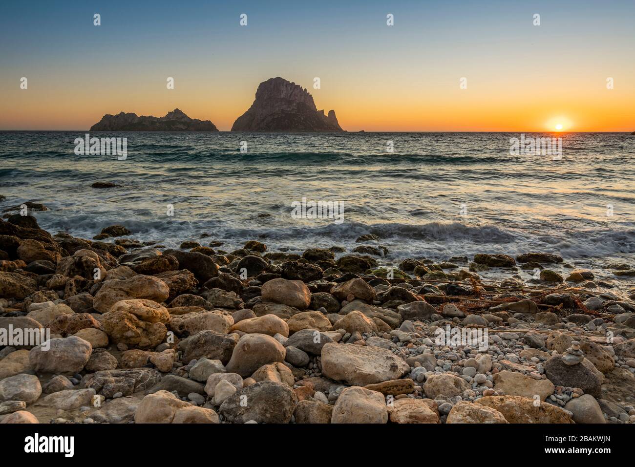 Sunset at Cala d'Hort beach, Ibiza, Balearic Islands, Spain Stock Photo