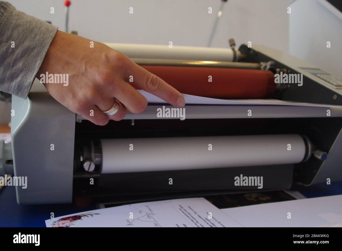 Plastic laminating machine Stock Photo Alamy
