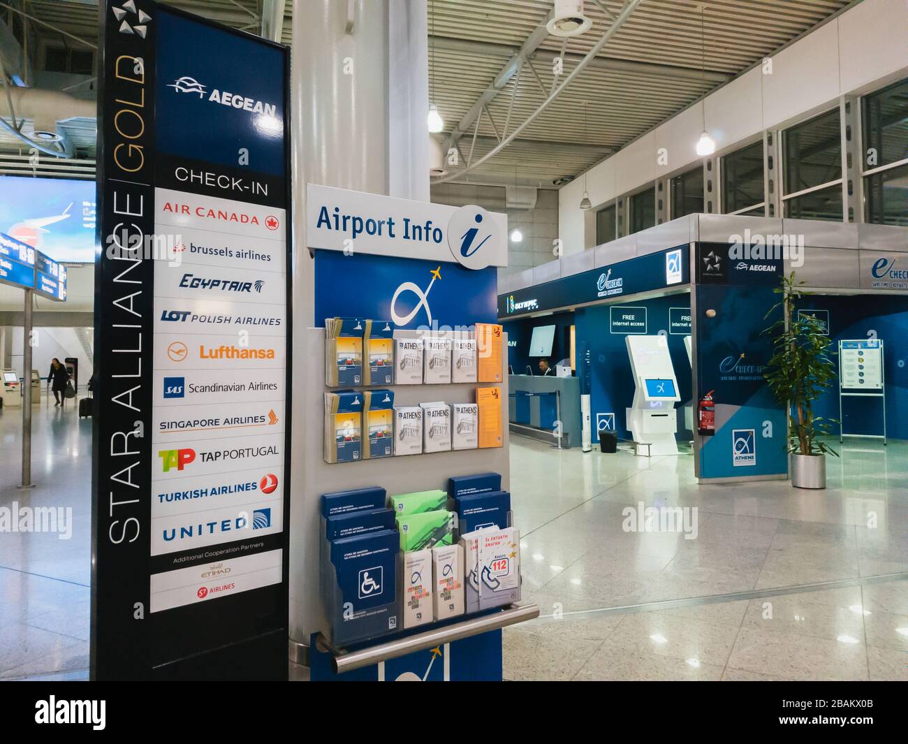 Athens, Greece - February, 11 2020: Information board for passengers and Star Alliance gold members in the departure hall of the main terminal of Stock Photo