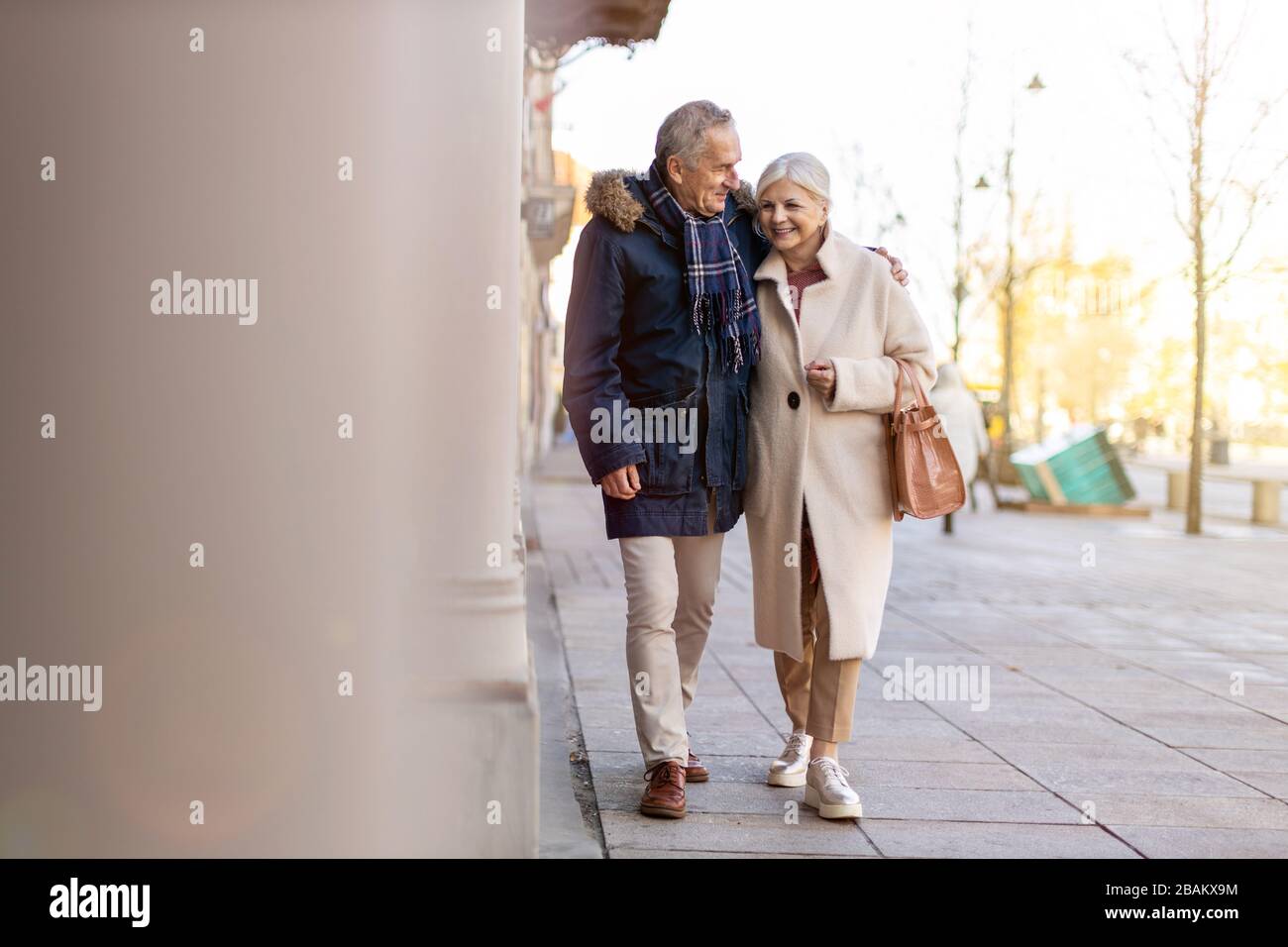 Mature woman walking winter hi-res stock photography and images - Alamy