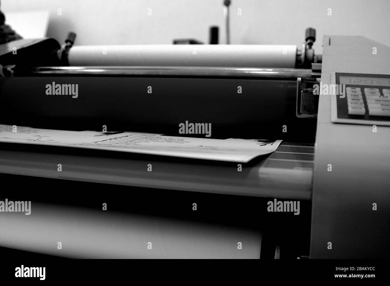 Plastic laminating machine Stock Photo Alamy