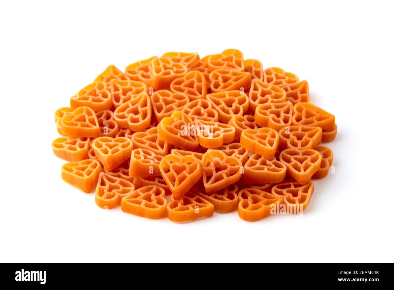 Heart shaped pasta on a white background Stock Photo