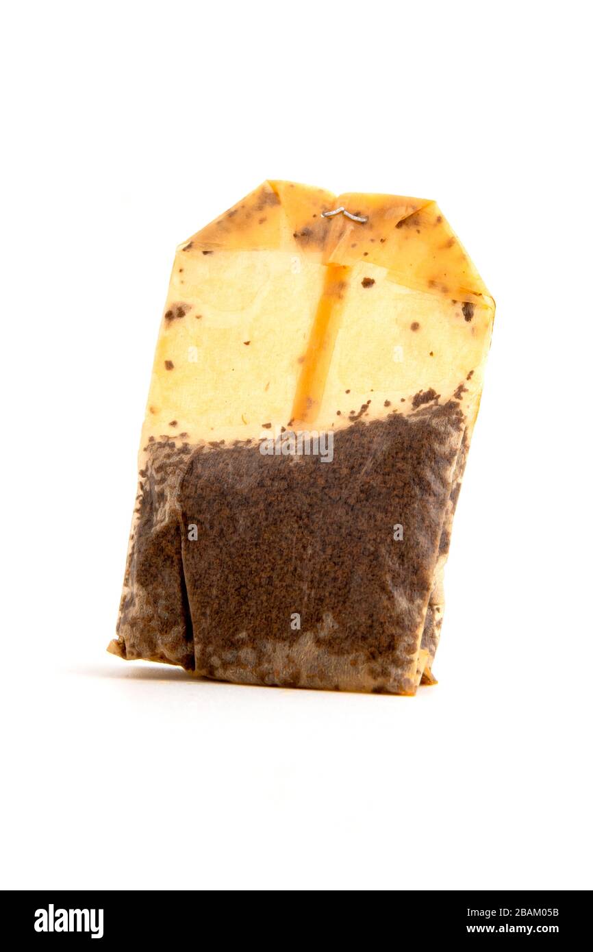 Used tea bag on a white background Stock Photo