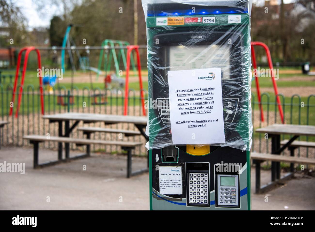 Parking meter in public park in Wilmslow, Cheshire, UK due to Coronavirus lock down on 29.03.20 to aim to reduce the spread of COVID-19 Stock Photo