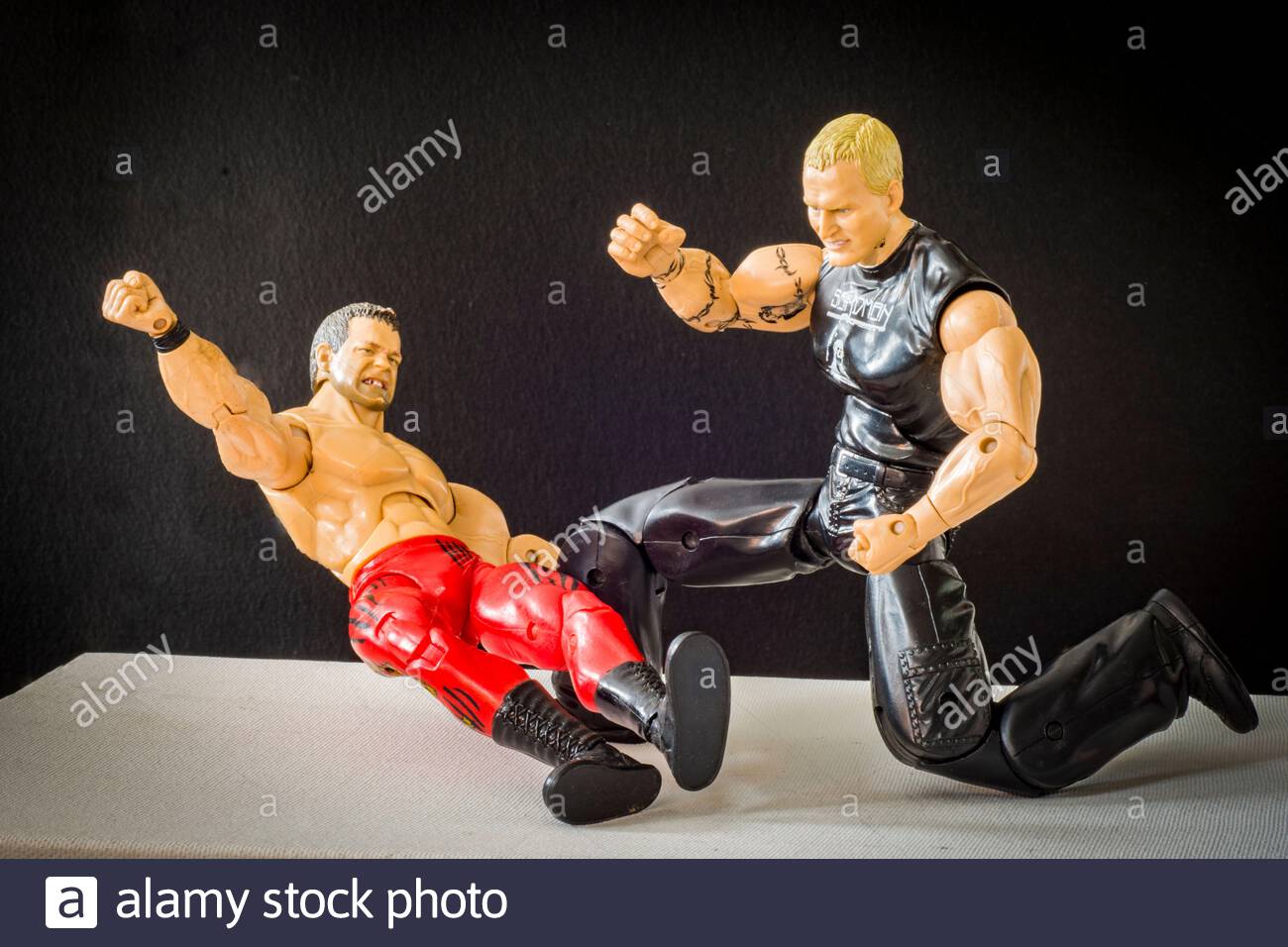wrestling figures fighting