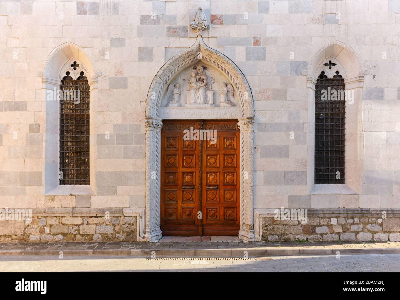 Entrance of che catholic church of Santa Maria della Fratta in San Daniele del Friuli, Italy Stock Photo