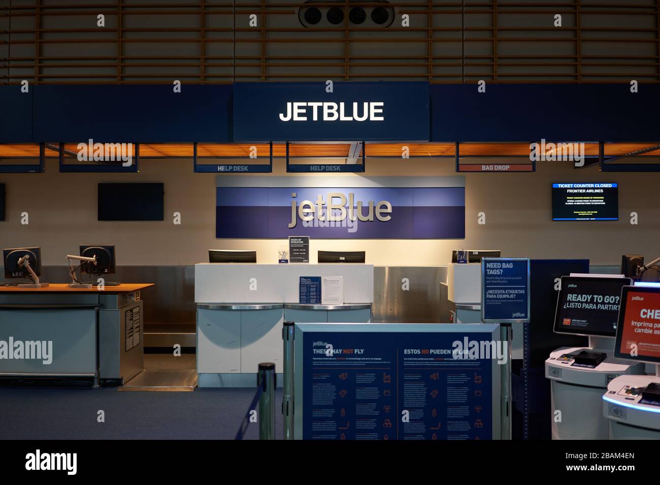 American low cost airline JetBlue Airways' check-in desk in Portland International Airport is seen closed at night on Feb 16, 2020. Stock Photo