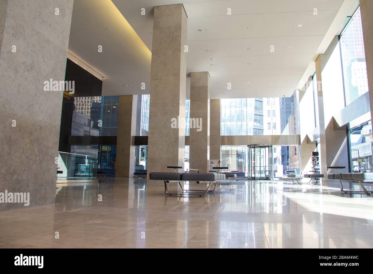 Sunlit empty office lobby Stock Photo