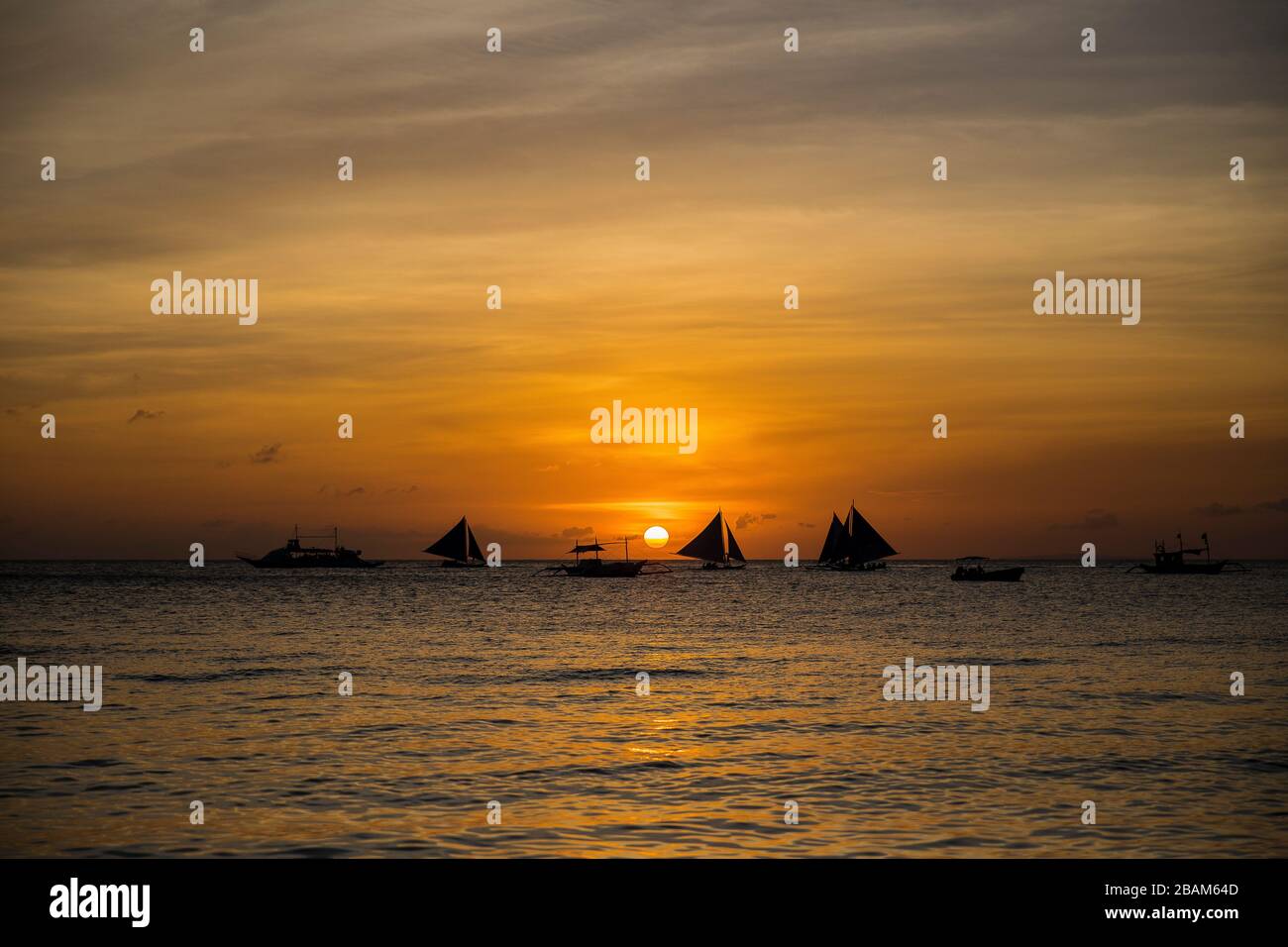 White beach sunset on Boracay island, Philippines Stock Photo - Alamy