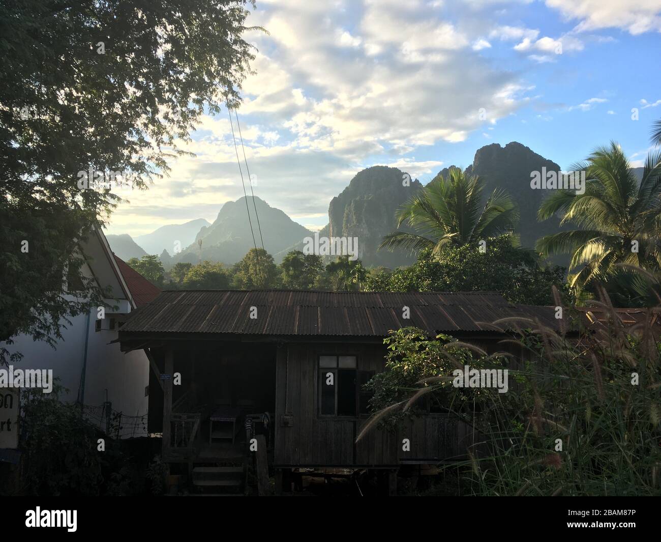 A Wooden House in the Mountain Jungle of Vang Vieng, Laos Republic Stock Photo