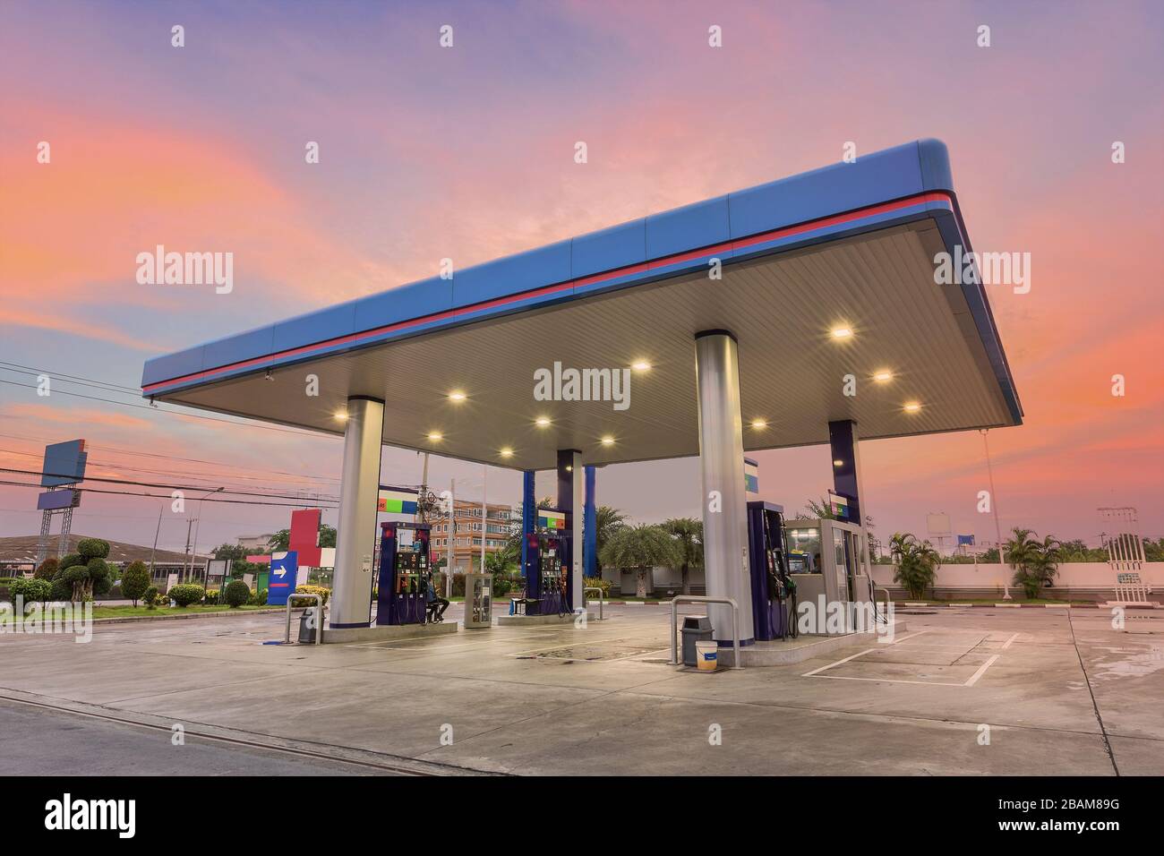Gas station at sunset Stock Photo Alamy
