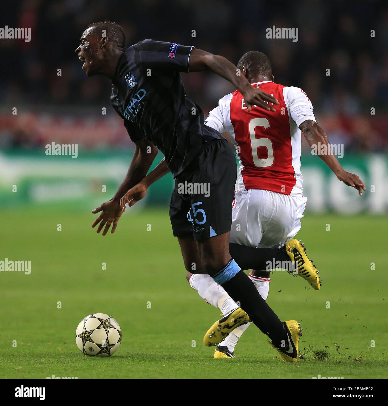 Ajax Amsterdam's Eyong Enoh and Manchester City's Mario Balotelli Stock Photo