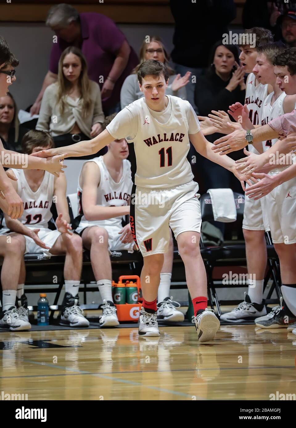 Basketball action with Wallace vs Kamiah High School in Coer d'Alene