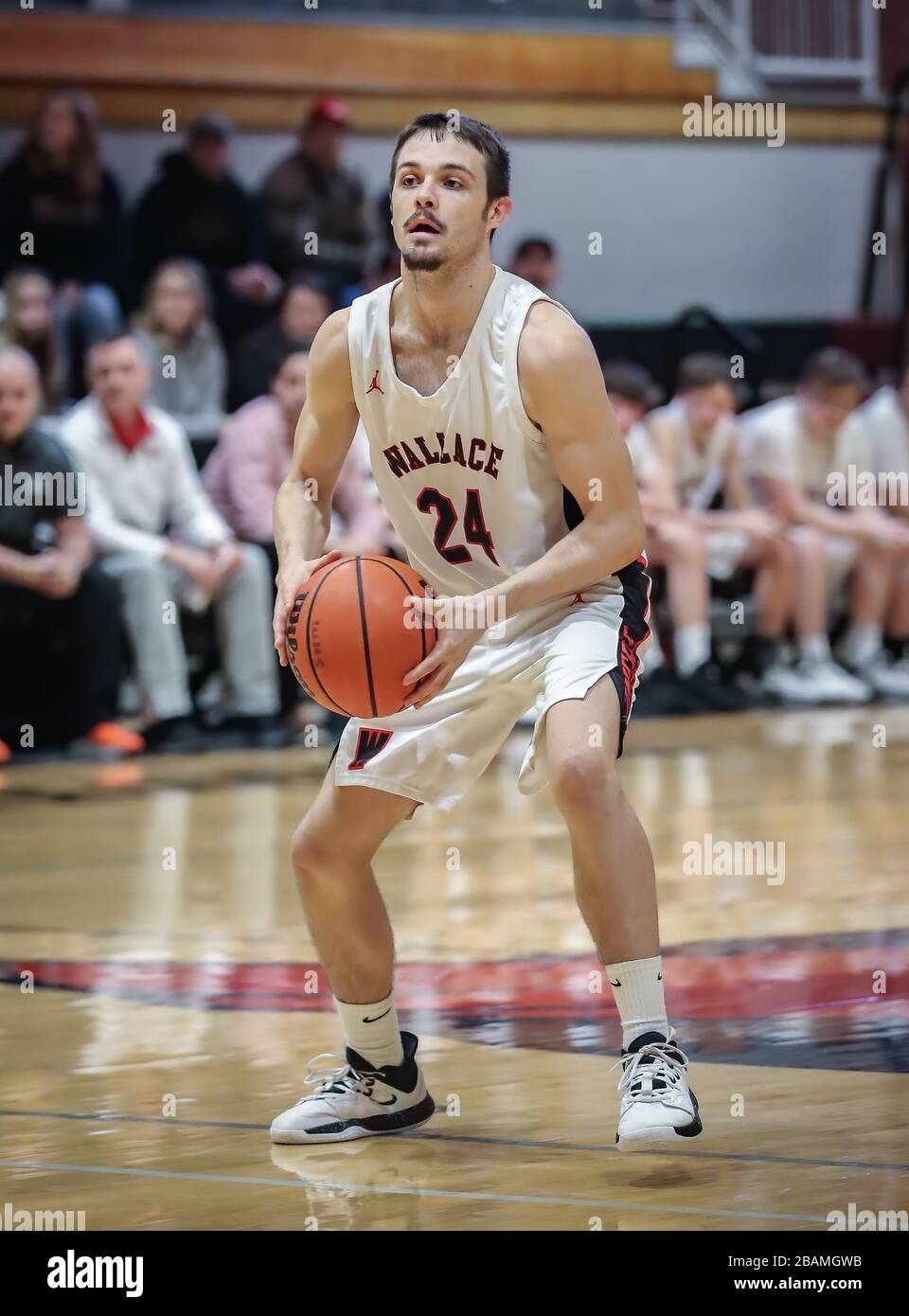 Basketball action with Wallace vs Kamiah High School in Coer d'Alene