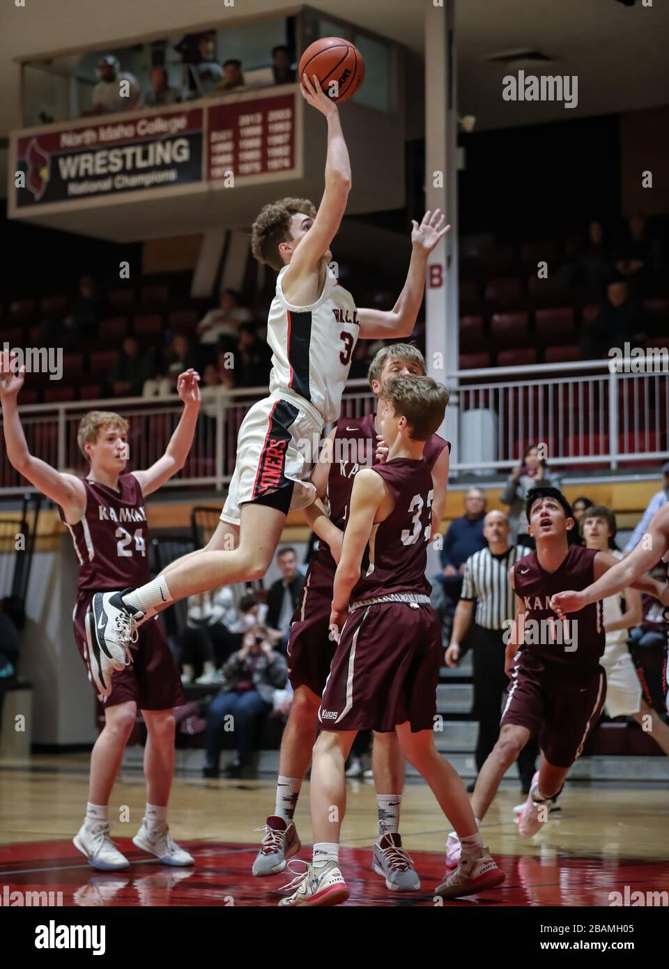 Basketball action with Wallace vs Kamiah High School in Coer d'Alene