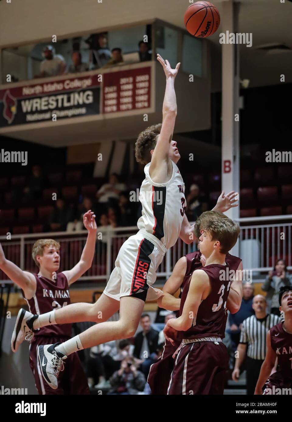 Basketball action with Wallace vs Kamiah High School in Coer d'Alene