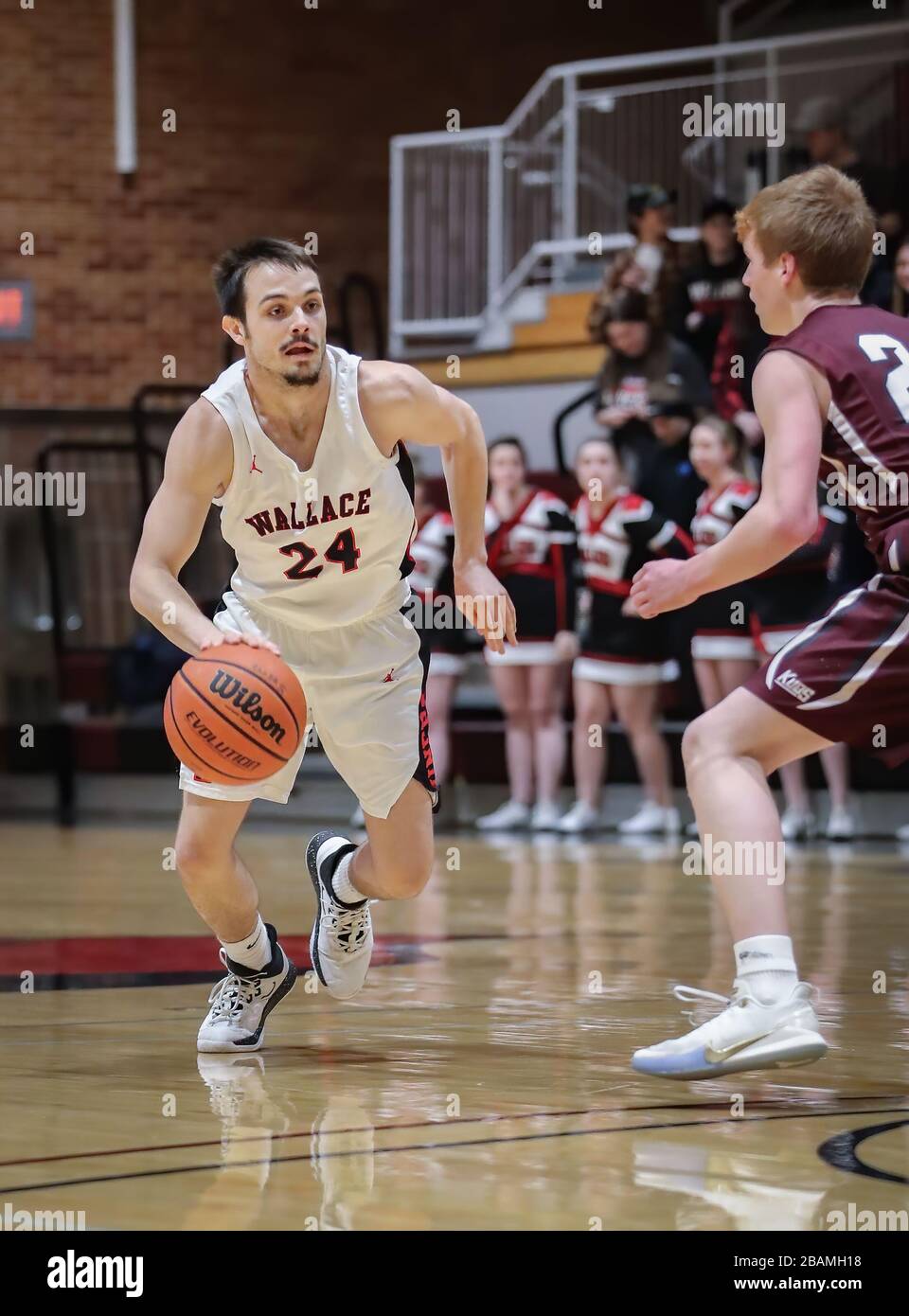 Basketball action with Wallace vs Kamiah High School in Coer d'Alene