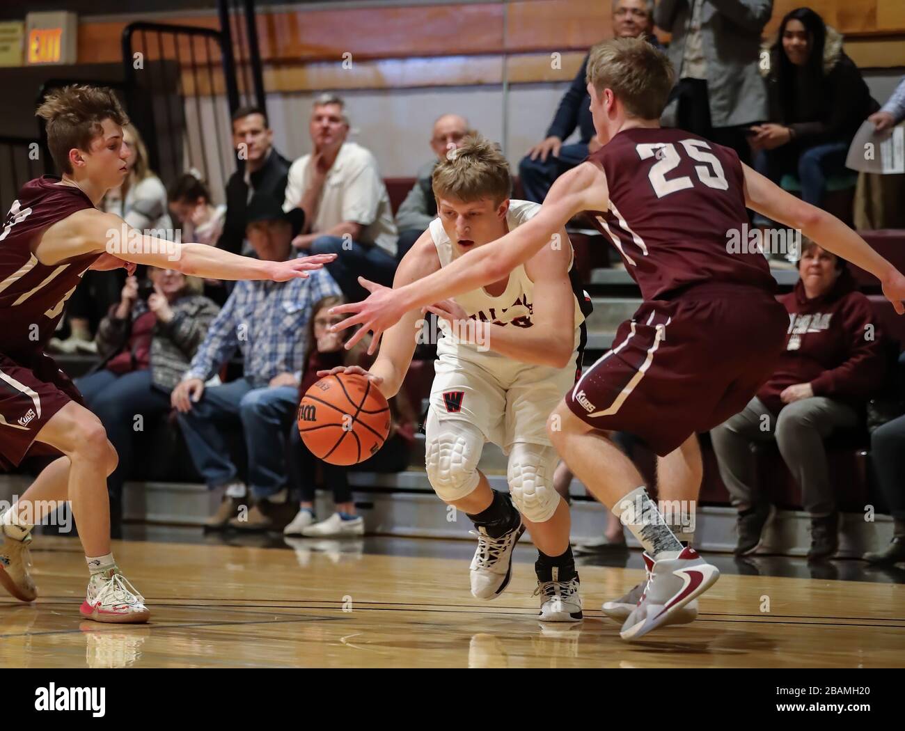Basketball action with Wallace vs Kamiah High School in Coer d'Alene